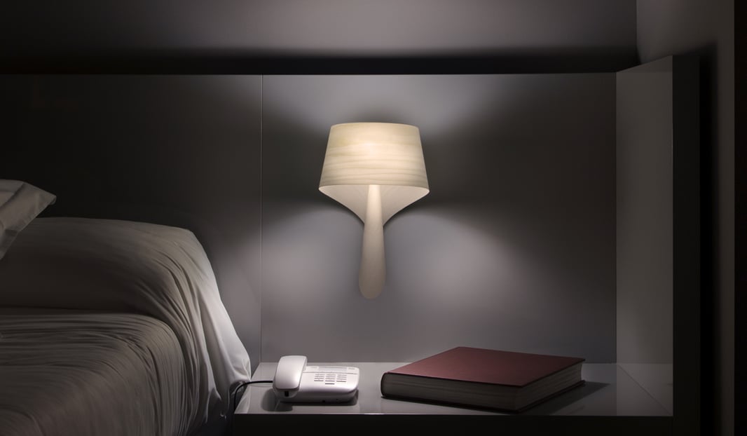 LZF wooden wall lamp in a hotel room
