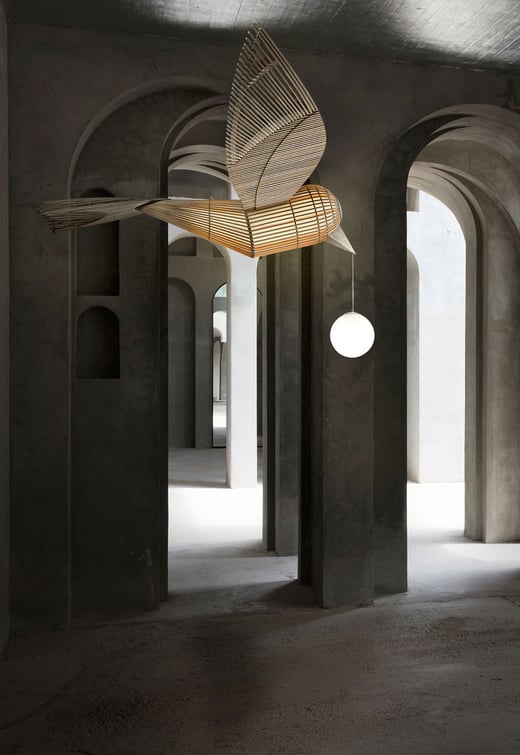 LZF handmade wooden bird lamp illuminating an architectural space