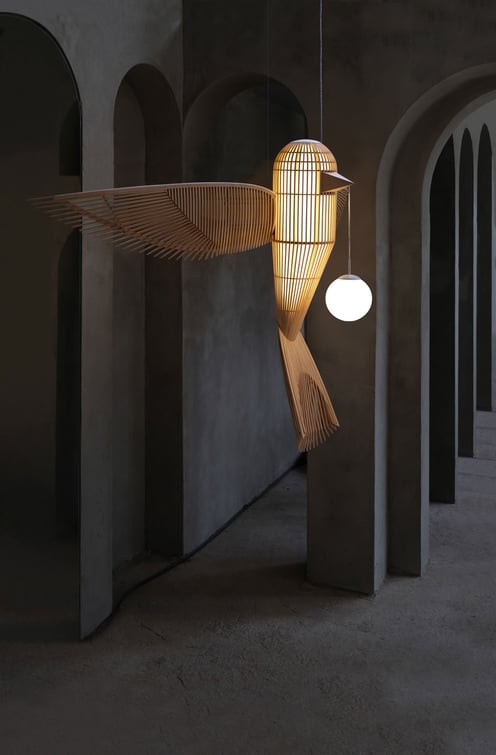 Big Bird lamp by LZF in vertical format illuminating an architectural space