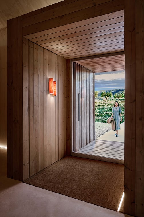 Entrance to a house illuminated with a LZF wooden wall light