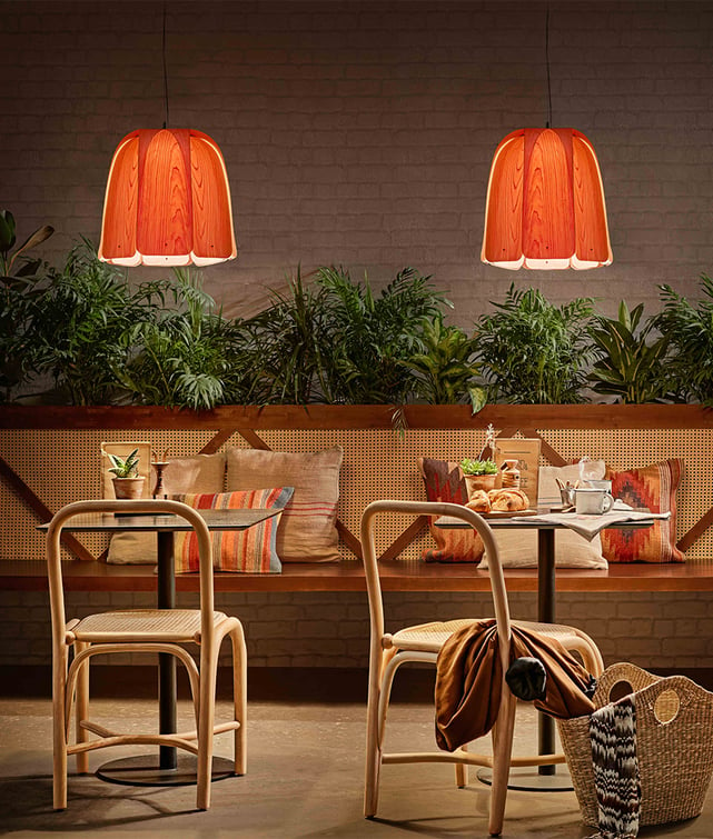 Domo lamps by LZF in natural cherry wood in a coffee shop