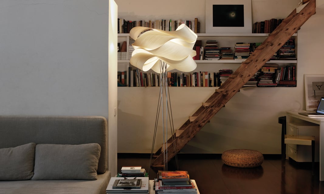 Living room detail of beautiful floor lamp with ivory white wood veneer light diffuser