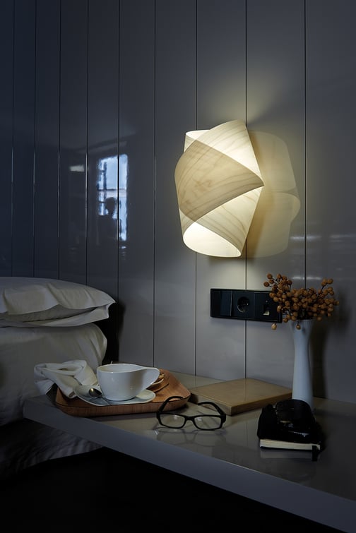 Hotel room with handmade wood veneer wall lamp