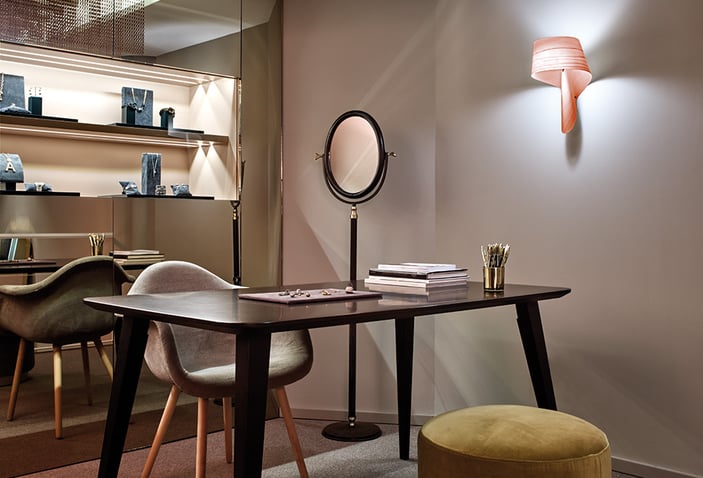 LZF pink-wooden-wall-lamp-in-the-office-of-a-jeweler's-shop
