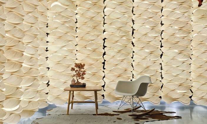 Customized wall-of-stacked-veneer-strip-lamps-Möbius