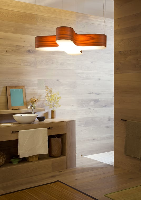 Bathroom area-with-cherry-wood-veneer-lamp-in-X-shape