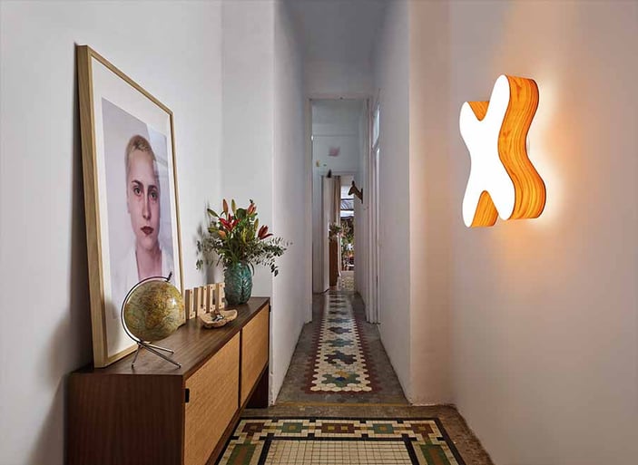 Illuminated corridor-with-X-shaped-LZF-wall-lamp