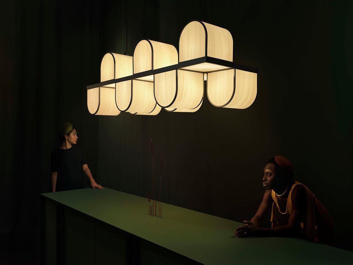 lamps with-simple-three-dimensional-arches-of-interlocking-wood-veneer