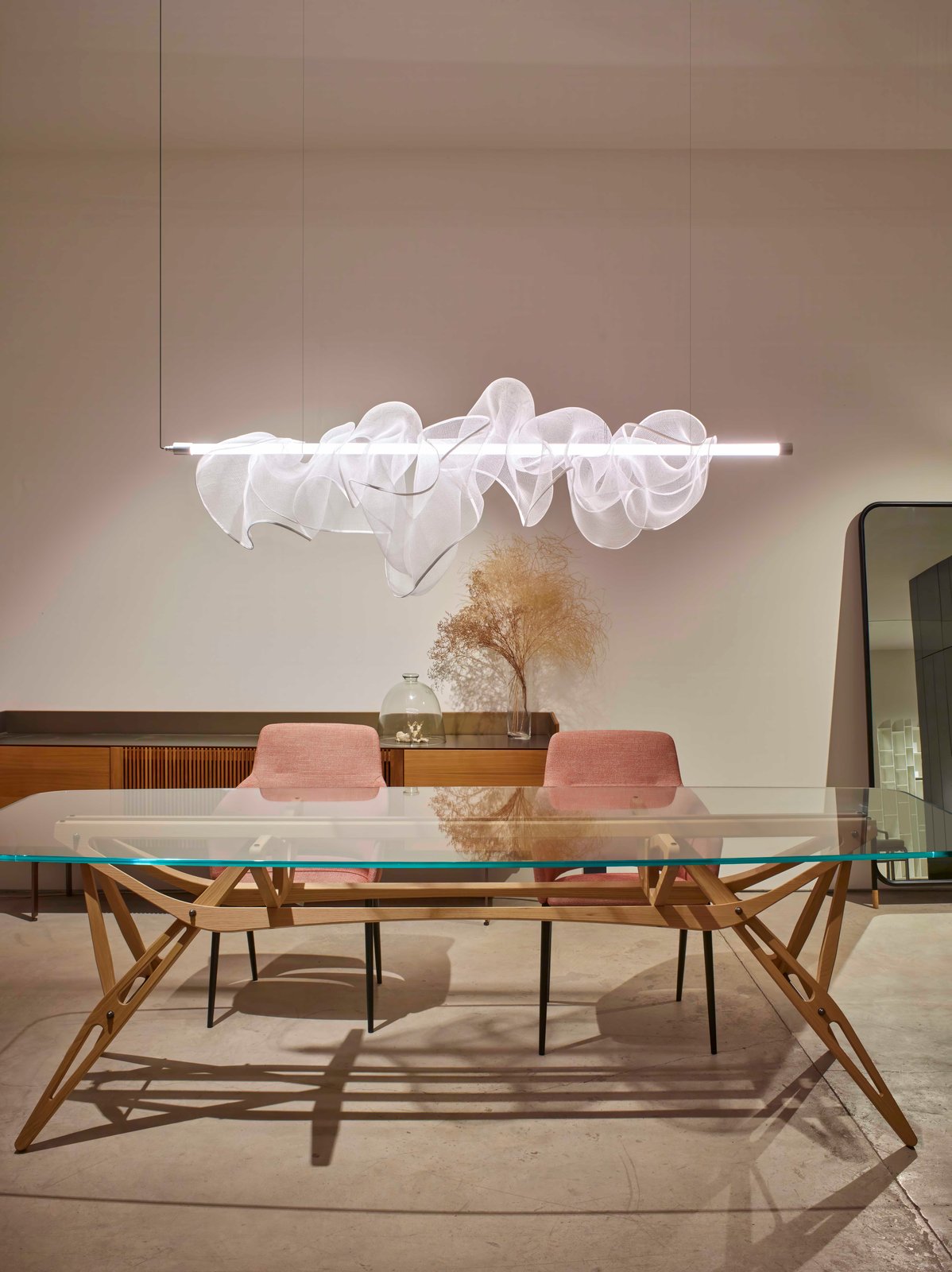 the cloud-lamp-above-glass-table