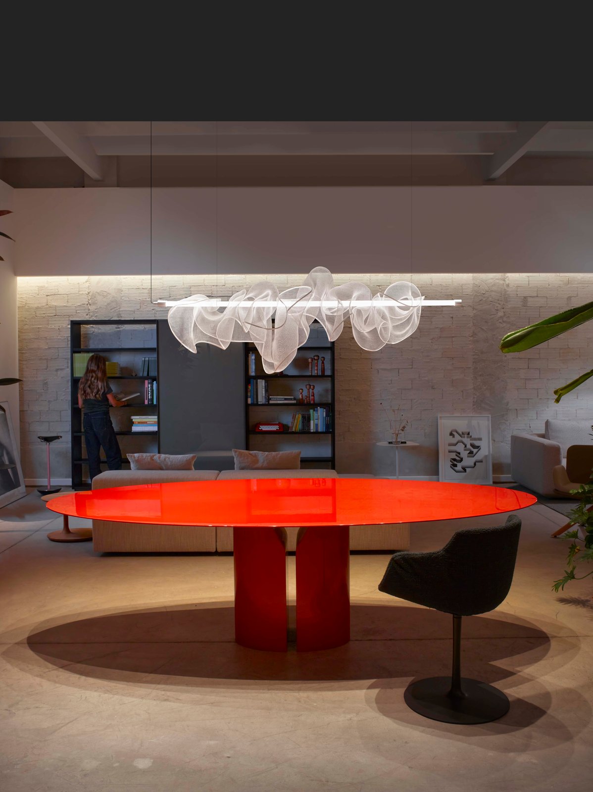 the cloud-lamp-above-red-table